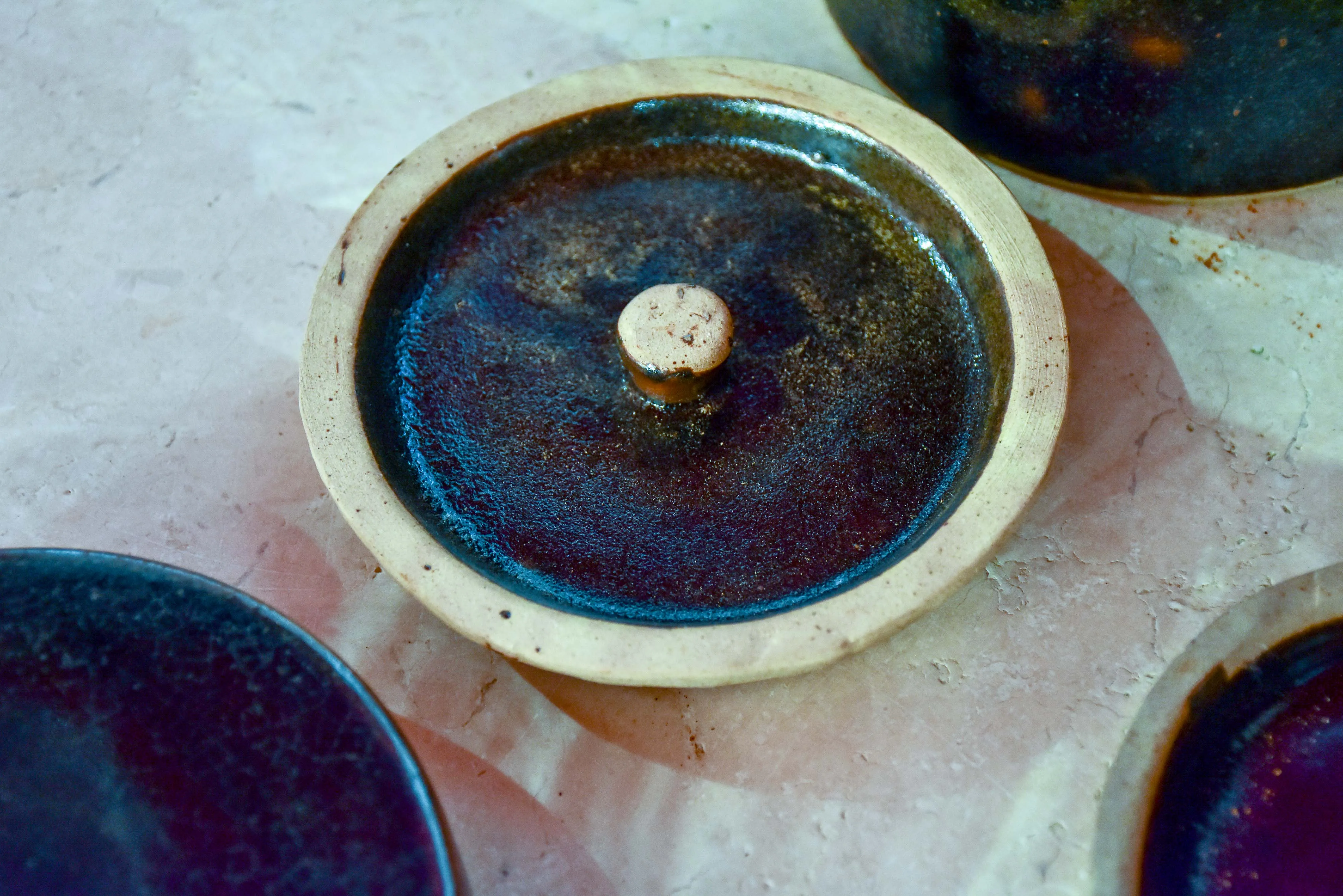 Collection of three double-lid stoneware tea canisters