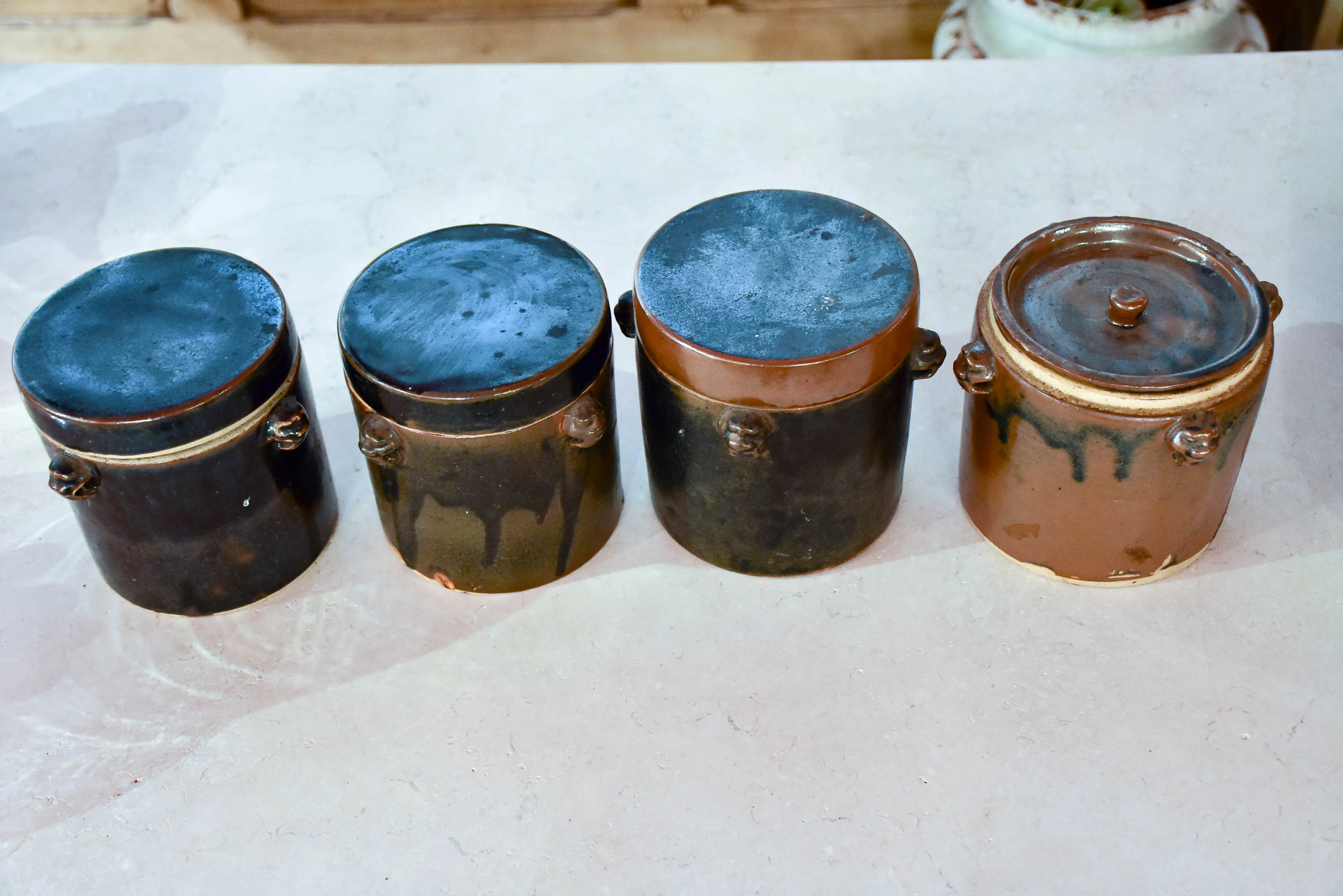 Collection of three double-lid stoneware tea canisters