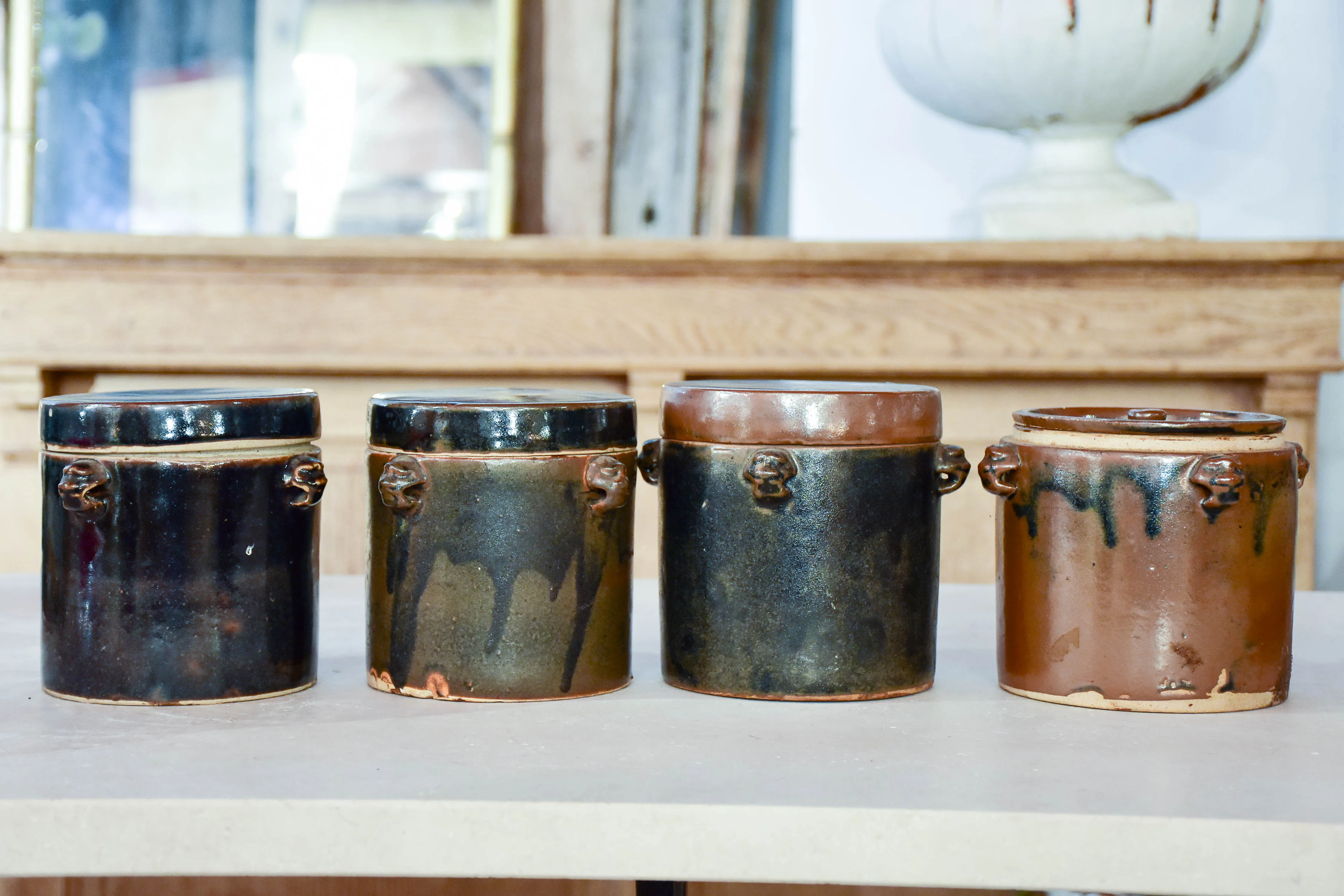 Collection of three double-lid stoneware tea canisters