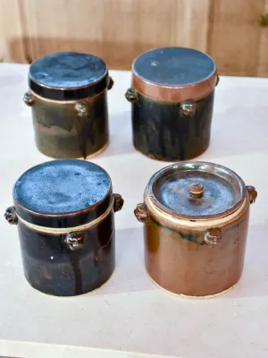 Collection of three double-lid stoneware tea canisters